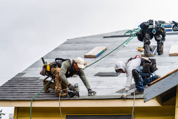 Professional Roof Replacement technician working in Strathmere, NJ